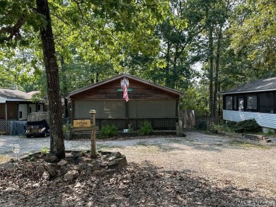 You will not want to miss this treat! Large porch with bar and on River Ridge Golf Club in Virginia - for sale on GolfHomes.com, golf home, golf lot