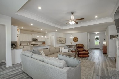 Nestled on the scenic fairways of The Island golf community on The Island Country Club in Louisiana - for sale on GolfHomes.com, golf home, golf lot