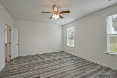 Nestled on the scenic fairways of The Island golf community on The Island Country Club in Louisiana - for sale on GolfHomes.com, golf home, golf lot