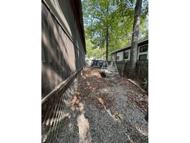 You will not want to miss this treat! Large porch with bar and on River Ridge Golf Club in Virginia - for sale on GolfHomes.com, golf home, golf lot