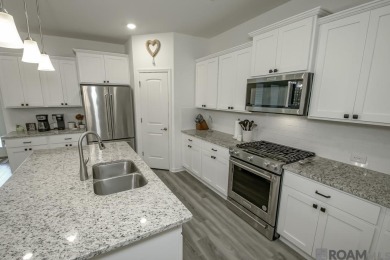 Nestled on the scenic fairways of The Island golf community on The Island Country Club in Louisiana - for sale on GolfHomes.com, golf home, golf lot