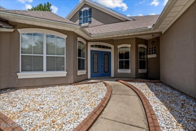 This beautiful home is positioned on a large corner lot in Eagle on Eagle Landing Golf Club in Florida - for sale on GolfHomes.com, golf home, golf lot