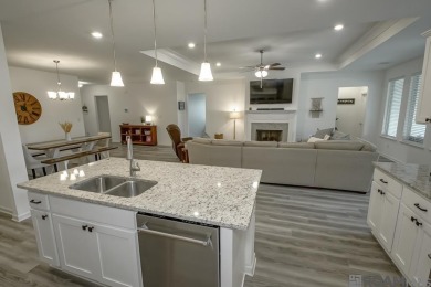 Nestled on the scenic fairways of The Island golf community on The Island Country Club in Louisiana - for sale on GolfHomes.com, golf home, golf lot