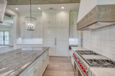 Stunning new home built by Bentley Custom Homes, and perched on Escondido Golf and Lake Club  in Texas - for sale on GolfHomes.com, golf home, golf lot