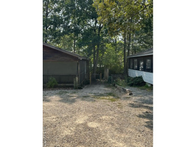 You will not want to miss this treat! Large porch with bar and on River Ridge Golf Club in Virginia - for sale on GolfHomes.com, golf home, golf lot