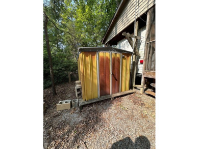 You will not want to miss this treat! Large porch with bar and on River Ridge Golf Club in Virginia - for sale on GolfHomes.com, golf home, golf lot