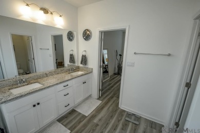 Nestled on the scenic fairways of The Island golf community on The Island Country Club in Louisiana - for sale on GolfHomes.com, golf home, golf lot