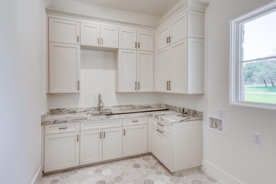 Stunning new home built by Bentley Custom Homes, and perched on Escondido Golf and Lake Club  in Texas - for sale on GolfHomes.com, golf home, golf lot
