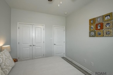 Nestled on the scenic fairways of The Island golf community on The Island Country Club in Louisiana - for sale on GolfHomes.com, golf home, golf lot