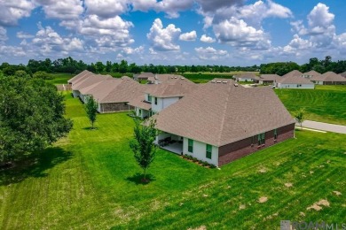 Nestled on the scenic fairways of The Island golf community on The Island Country Club in Louisiana - for sale on GolfHomes.com, golf home, golf lot