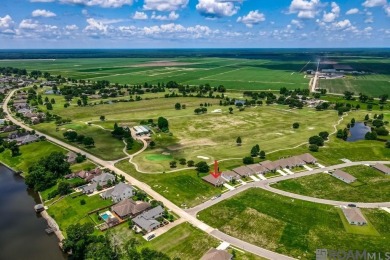 Nestled on the scenic fairways of The Island golf community on The Island Country Club in Louisiana - for sale on GolfHomes.com, golf home, golf lot