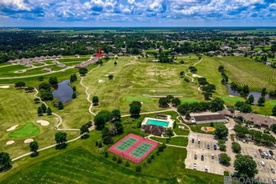 Nestled on the scenic fairways of The Island golf community on The Island Country Club in Louisiana - for sale on GolfHomes.com, golf home, golf lot