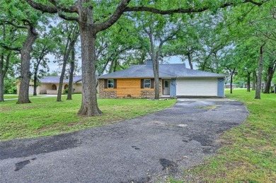 Discover your dream home on the #1 hole of Lake Kiowa's premier on Lake Kiowa Golf Course in Texas - for sale on GolfHomes.com, golf home, golf lot