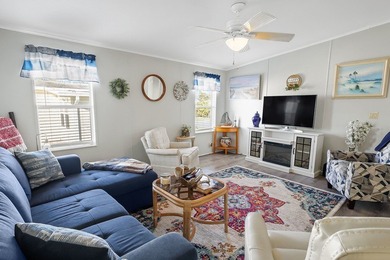 Well-designed 3/2 split bedroom home featuring spacious living on Barefoot Bay Golf Course in Florida - for sale on GolfHomes.com, golf home, golf lot