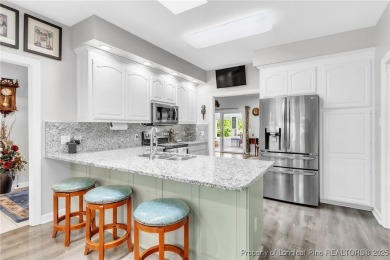 Are you looking for a gorgeous waterfront property? If so on Carolina Trace Country Club in North Carolina - for sale on GolfHomes.com, golf home, golf lot