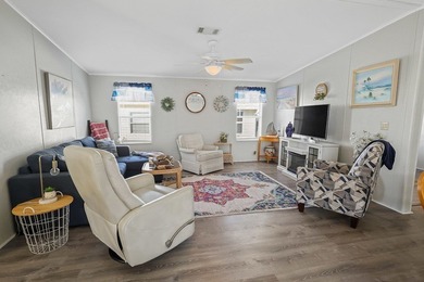 Well-designed 3/2 split bedroom home featuring spacious living on Barefoot Bay Golf Course in Florida - for sale on GolfHomes.com, golf home, golf lot