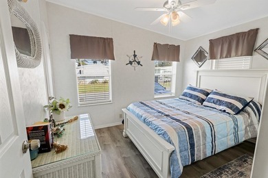 Well-designed 3/2 split bedroom home featuring spacious living on Barefoot Bay Golf Course in Florida - for sale on GolfHomes.com, golf home, golf lot