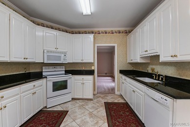 TOWNE LAKE home with peaceful WATERFRONT views of the canal and on Arrowhead Country Club in Alabama - for sale on GolfHomes.com, golf home, golf lot