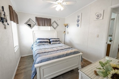 Well-designed 3/2 split bedroom home featuring spacious living on Barefoot Bay Golf Course in Florida - for sale on GolfHomes.com, golf home, golf lot