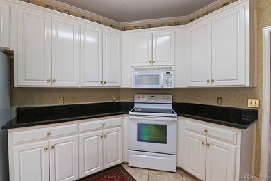 TOWNE LAKE home with peaceful WATERFRONT views of the canal and on Arrowhead Country Club in Alabama - for sale on GolfHomes.com, golf home, golf lot