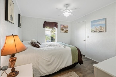 Well-designed 3/2 split bedroom home featuring spacious living on Barefoot Bay Golf Course in Florida - for sale on GolfHomes.com, golf home, golf lot