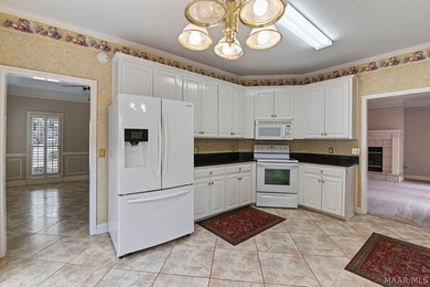 TOWNE LAKE home with peaceful WATERFRONT views of the canal and on Arrowhead Country Club in Alabama - for sale on GolfHomes.com, golf home, golf lot