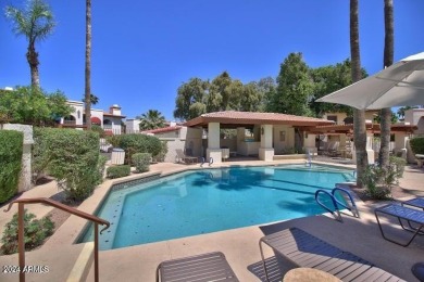 Located in a serene golf course setting, this lovely 2-bedroom on Arizona Grand Resort Golf Course in Arizona - for sale on GolfHomes.com, golf home, golf lot