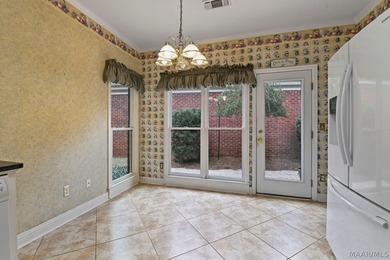 TOWNE LAKE home with peaceful WATERFRONT views of the canal and on Arrowhead Country Club in Alabama - for sale on GolfHomes.com, golf home, golf lot