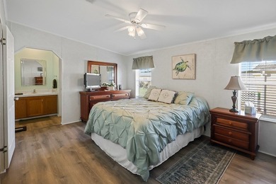 Well-designed 3/2 split bedroom home featuring spacious living on Barefoot Bay Golf Course in Florida - for sale on GolfHomes.com, golf home, golf lot