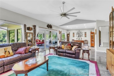 Are you looking for a gorgeous waterfront property? If so on Carolina Trace Country Club in North Carolina - for sale on GolfHomes.com, golf home, golf lot