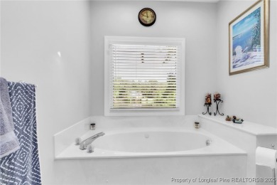 Are you looking for a gorgeous waterfront property? If so on Carolina Trace Country Club in North Carolina - for sale on GolfHomes.com, golf home, golf lot