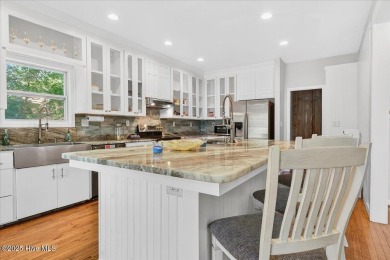 Tucked near the end of a quiet cul-de-sac and bordered by the on Brick Landing Plantation Yacht and Golf Club in North Carolina - for sale on GolfHomes.com, golf home, golf lot