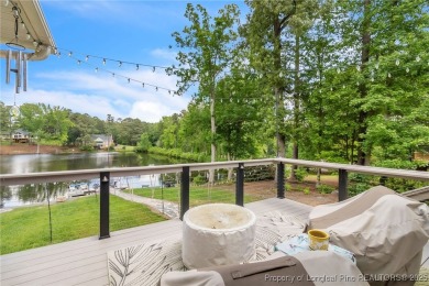 Are you looking for a gorgeous waterfront property? If so on Carolina Trace Country Club in North Carolina - for sale on GolfHomes.com, golf home, golf lot