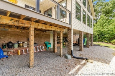 Are you looking for a gorgeous waterfront property? If so on Carolina Trace Country Club in North Carolina - for sale on GolfHomes.com, golf home, golf lot