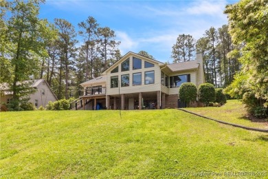 Are you looking for a gorgeous waterfront property? If so on Carolina Trace Country Club in North Carolina - for sale on GolfHomes.com, golf home, golf lot