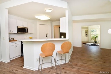 Discover the perfect blend of comfort and elegance in this on The Heathers Club in Michigan - for sale on GolfHomes.com, golf home, golf lot