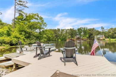 Are you looking for a gorgeous waterfront property? If so on Carolina Trace Country Club in North Carolina - for sale on GolfHomes.com, golf home, golf lot