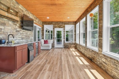 Tucked near the end of a quiet cul-de-sac and bordered by the on Brick Landing Plantation Yacht and Golf Club in North Carolina - for sale on GolfHomes.com, golf home, golf lot