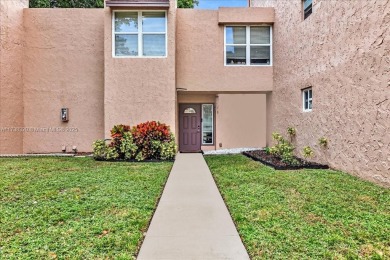 Spectacular 3/2.5 Townhome in prestigious community Pine Island on Pine Island Ridge Country Club in Florida - for sale on GolfHomes.com, golf home, golf lot