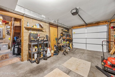 Discover a light-filled Jim Barna log home designed for quiet on Heatherhurst Golf Course in Tennessee - for sale on GolfHomes.com, golf home, golf lot