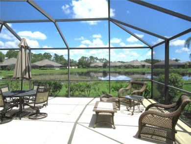 A 2/3 bedroom, 2 bath villa with wonderful lake views and a on Sabal Trace Golf and Country Club in Florida - for sale on GolfHomes.com, golf home, golf lot