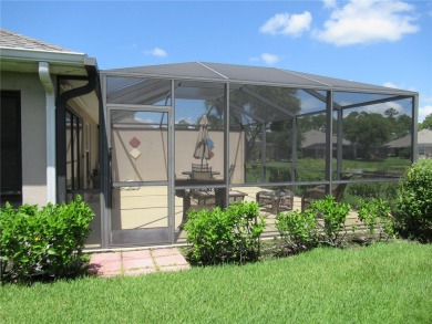 A 2/3 bedroom, 2 bath villa with wonderful lake views and a on Sabal Trace Golf and Country Club in Florida - for sale on GolfHomes.com, golf home, golf lot