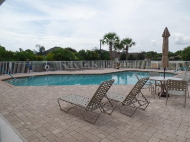 A 2/3 bedroom, 2 bath villa with wonderful lake views and a on Sabal Trace Golf and Country Club in Florida - for sale on GolfHomes.com, golf home, golf lot