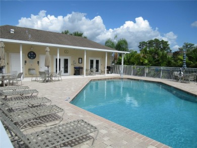 A 2/3 bedroom, 2 bath villa with wonderful lake views and a on Sabal Trace Golf and Country Club in Florida - for sale on GolfHomes.com, golf home, golf lot