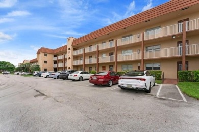 Great first floor 2/2 condo located in the 55+ community of on Sunrise Lakes Phase III in Florida - for sale on GolfHomes.com, golf home, golf lot