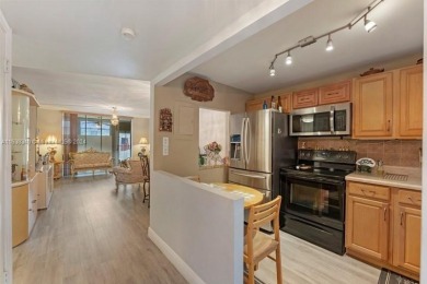 Great first floor 2/2 condo located in the 55+ community of on Sunrise Lakes Phase III in Florida - for sale on GolfHomes.com, golf home, golf lot