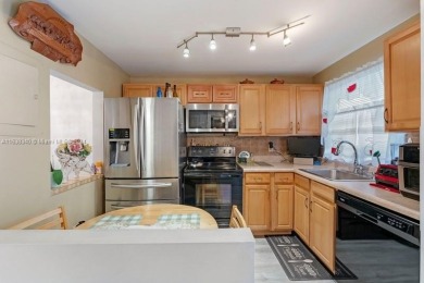 Great first floor 2/2 condo located in the 55+ community of on Sunrise Lakes Phase III in Florida - for sale on GolfHomes.com, golf home, golf lot