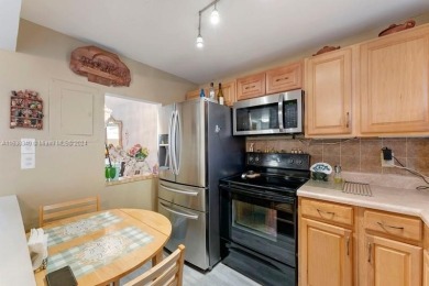 Great first floor 2/2 condo located in the 55+ community of on Sunrise Lakes Phase III in Florida - for sale on GolfHomes.com, golf home, golf lot