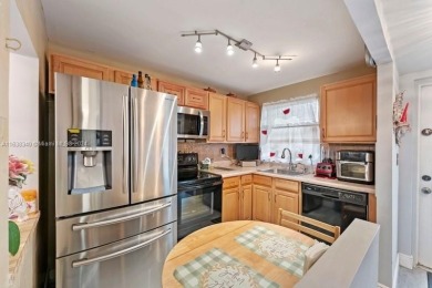 Great first floor 2/2 condo located in the 55+ community of on Sunrise Lakes Phase III in Florida - for sale on GolfHomes.com, golf home, golf lot