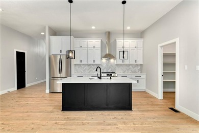 Two high-quality newly constructed 3BR2BA lake homes at Linn on Linn Valley Lakes - Deer Trace Golf Course in Kansas - for sale on GolfHomes.com, golf home, golf lot